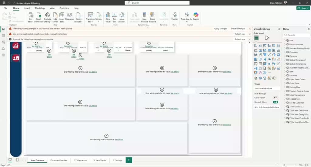 Power BI report canvas with persistent errors before field name corrections